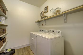 Dedicated laundry room with washers & dryers